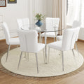 Table And Chair Set.A Modern Minimalist Round Dining Table With Transparent Tempered Glass Top And Silver Metal Legs,Paried With 6 Chairs With Pu Backrest And Seat Cushion And Silver Metal Legs.