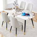 Modern Minimalist Dining Table. Imitation Marble Patterned Stone Burning Tabletop With Black Metal Legs.Modern Dining Chair With Pu Artificial Leather Backrest Cushion And Black Metal Legs.F 001 C 007 Black Gold Sintered Stone