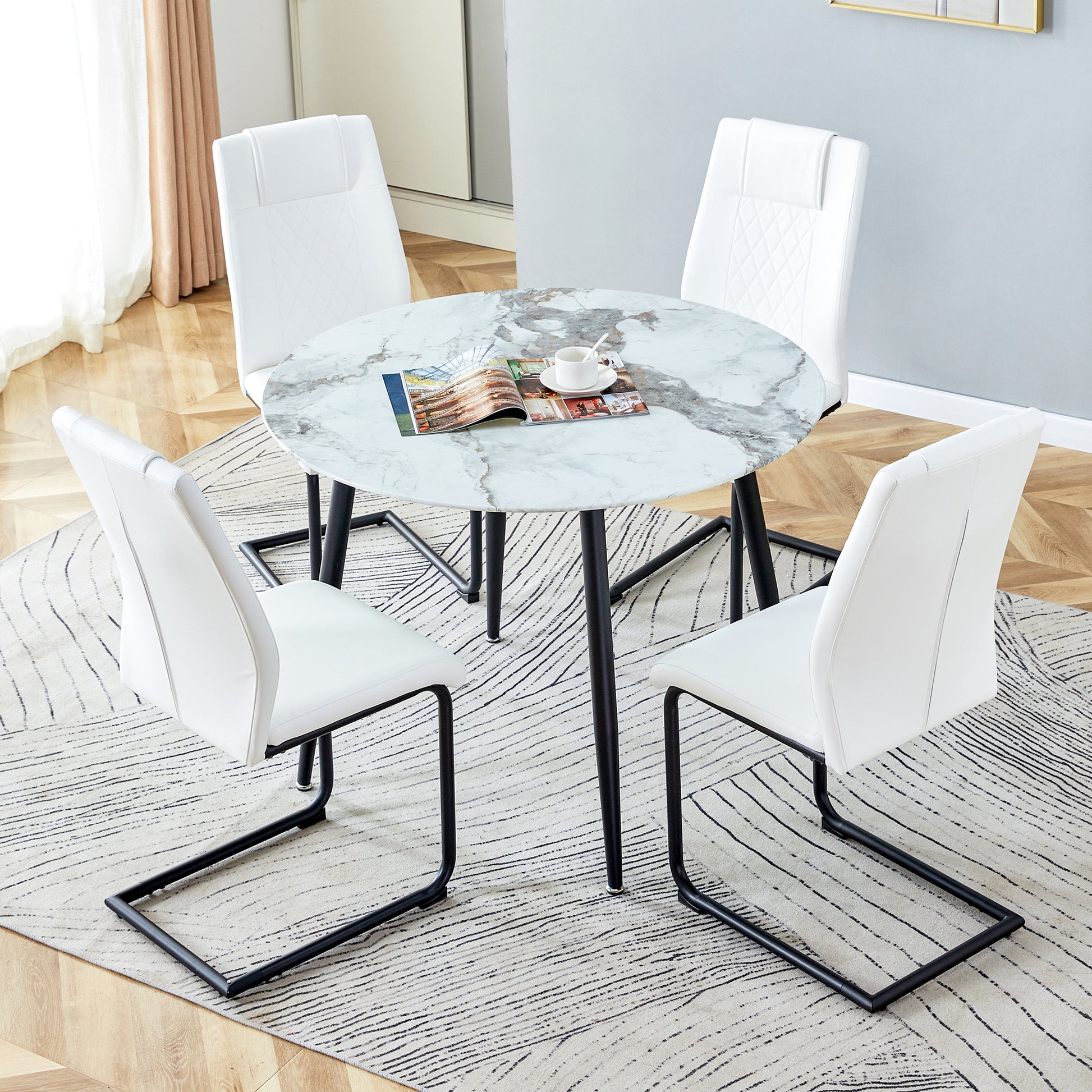 Table And Chair Set. Large Modern White Imitation Marble Patterned Round Table With Black Metal Legs. Nice Minimalism, Comfortable Seats And Black Metal Legs. White Black Seats 4 Glass Metal