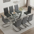 Table And Chair Set. Large Modern Rectangular Table With Glass Top And Silver Metal Legs. Furnished With Soft And Comfortable Pu Chairs With Faux Leather Upholstered Seats And Silver Metal Legs. Gray Silver Seats 8 Glass Metal