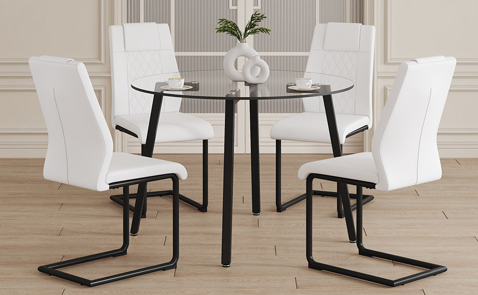 Table And Chair Set.A Modern Minimalist Style Round Clear Tempered Glass Table With Black Metal Legs.Paried With 4 Chairs With Modern Pu Leather High Back Upholstered And C Tube Black Metal Legs.