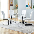 Table And Chair Set. Large Modern White Imitation Marble Patterned Round Table With Black Metal Legs. Nice Minimalism, Comfortable Seats And Black Metal Legs. White Black Seats 4 Glass Metal