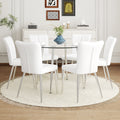 Table And Chair Set.A Modern Minimalist Round Dining Table With Transparent Tempered Glass Top And Silver Metal Legs,Paried With 6 Chairs With Pu Backrest And Seat Cushion And Silver Metal Legs.