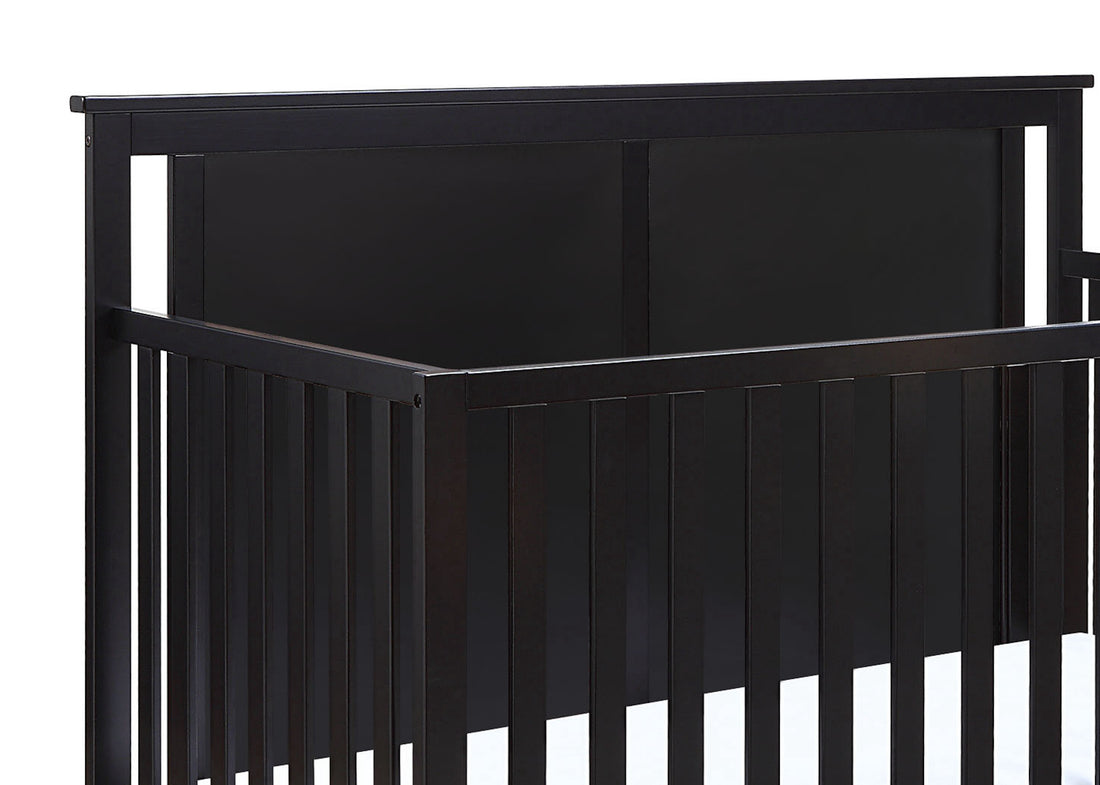 Connelly Mini Crib With Mattress Pad Black Vintage Walnut Black Brown Wood