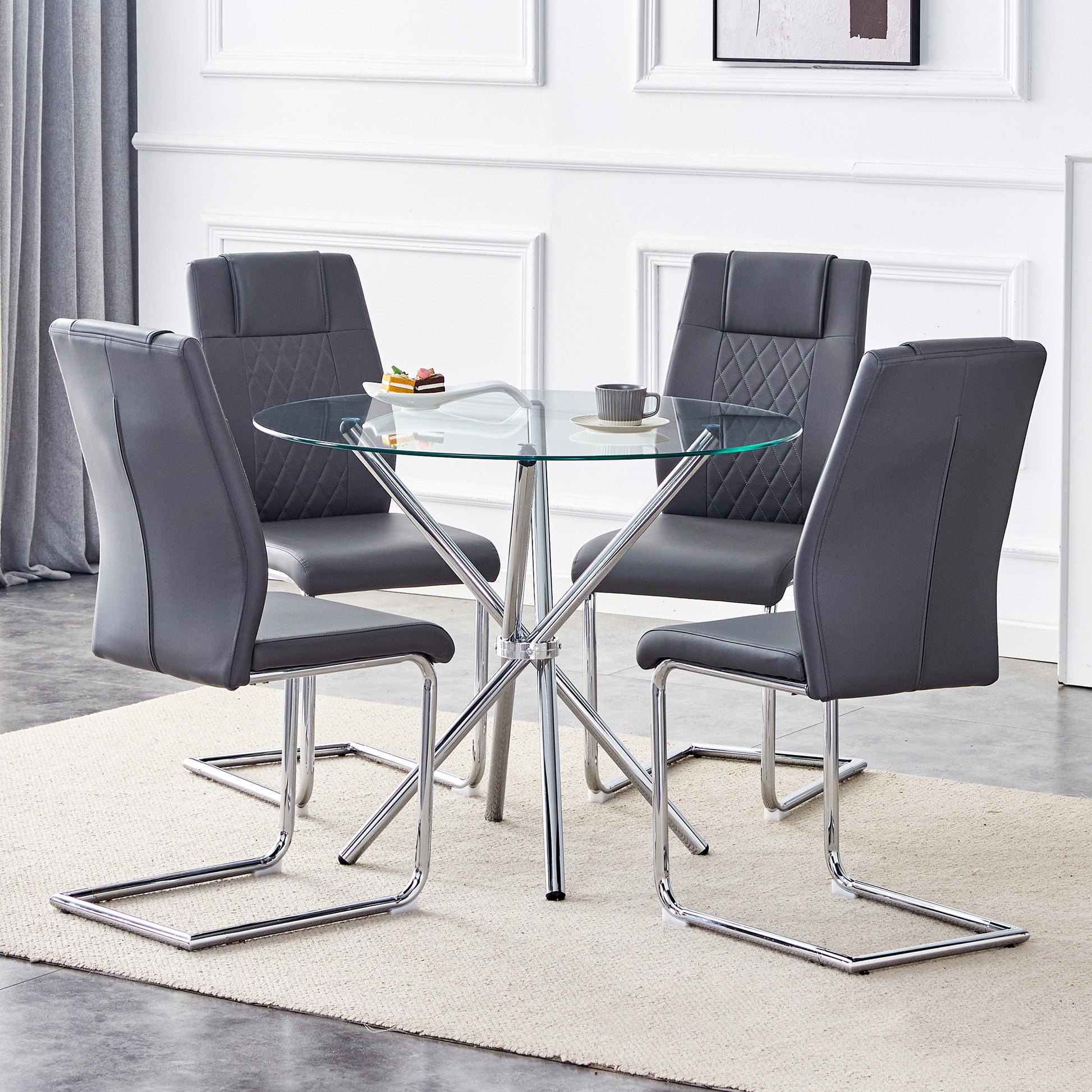 Table And Chair Set.36.6"Round Clear Glass Dining Table With A Unique Shape With Ring Shaped Gathered Silver Metal Legs.Paired With 4 Dark Gray High Quality Pu Dining Chairs With Silver Metal Legs.