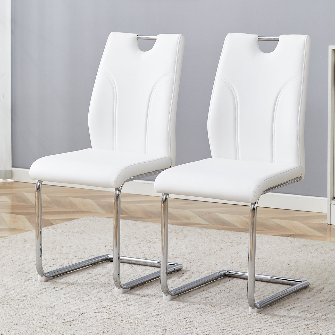 White Pu Dining Chair Set.Uniquely Designed White Dining Chairs. Pu Material, Paired With Silver Metal Chair Legs. Suitable For Offices, Restaurants, Kitchens, Conference Rooms, Etc. Set Of 2 White