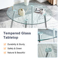 Table And Chair Set.A Modern Minimalist Round Dining Table With Transparent Tempered Glass Top And Silver Metal Legs,Paried With 6 Chairs With Pu Backrest And Seat Cushion And Silver Metal Legs. Black,Transparent Seats 6 Glass Metal