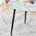 Table And Chair Set. Large Modern White Imitation Marble Patterned Round Table With Black Metal Legs. Nice Minimalism, Comfortable Seats And Black Metal Legs. White Black Seats 4 Glass Metal