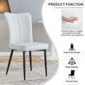 Table And Chair Set. Large Modern White Imitation Marble Patterned Round Table With Black Metal Legs. Nice Minimalism, Comfortable Seats And Black Metal Legs. White Gray Seats 4 Glass Metal