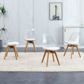 Modern Chairs Can Rotate 360 Degrees. The Backrest Is Made Of Pet Material, The Seat Cushion Is Made Of Pu Material, And The Support Legs Are Made Of Oak. Set Of 4 White Wood