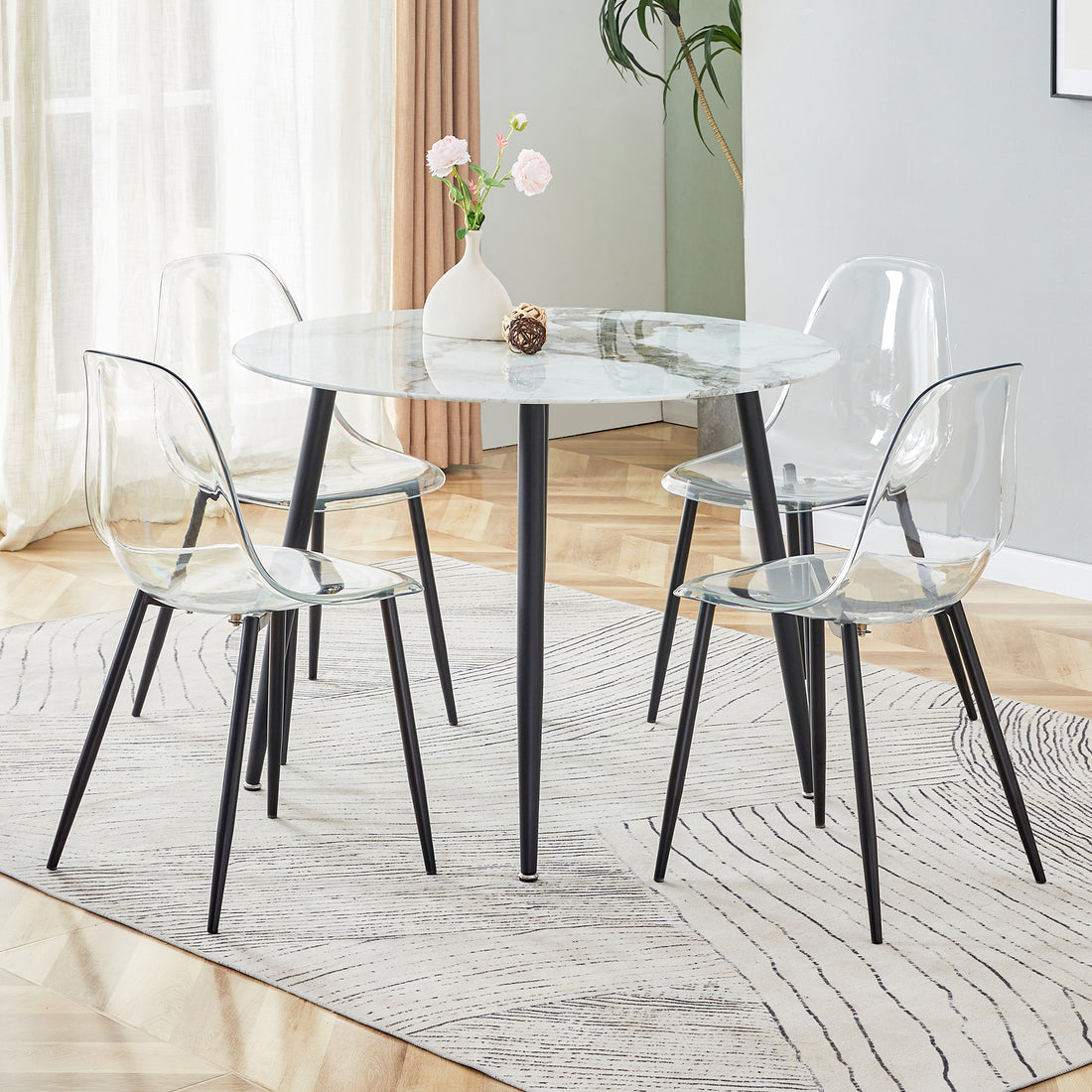 Table And Chair Set. Large Modern White Imitation Marble Patterned Round Table With Black Metal Legs. Nice Minimalist With Transparent Seats And Black Metal Legs. White Black Seats 4 Glass Metal