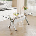 Dining Table. Modern Tempered Glass Dining Table. Large Modern Office Desk With Silver Plated Metal Legs And Mdf Crossbars, Suitable For Both Home And Office Use. Kitchen. 71 ''X35.4''X30 '' 1105 Transparent Glass
