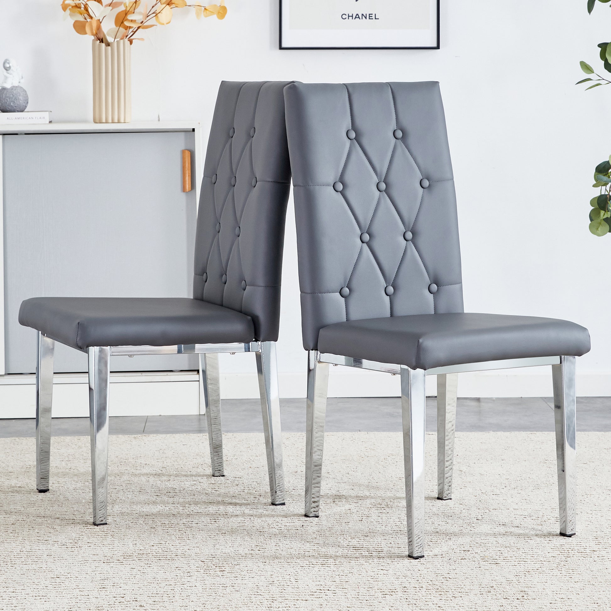 2 Piece Set Of Gray Armless Dining Chairs Brings A Touch Of Elegance And Mystery To The Dining Area With Its Deep Gray Tone,The Grid And Buckle Design Of The Back Add A Vintage Yet Fashionable Touch Gray Set Of 2 Pu