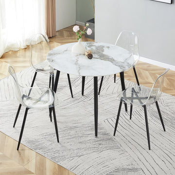 Table And Chair Set. Large Modern White Imitation Marble Patterned Round Table With Black Metal Legs. Nice Minimalist With Transparent Seats And Black Metal Legs. White Black Seats 4 Glass Metal