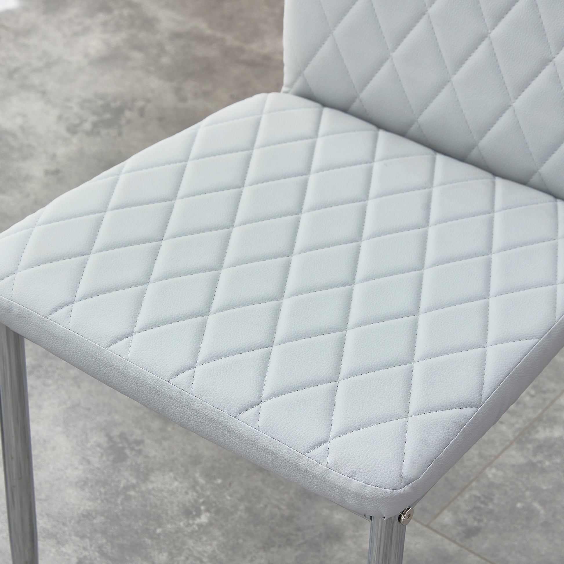 Table And Chair Set.Rectangular Dining Table With Tempered Glass Tabletop And Silver Plating Metal Legs.Paired With 6 Checkered Armless High Back Light Gray Chairs With Electroplated Metal Legs. Transparent Seats 6 Glass Metal