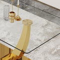 Modern Simple Rectangular Dining Table With Clear Glass Top And Smooth Gold Legs. Suitable For Kitchen, Dining Room And Living Room. Golden Glass