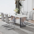 Modern Minimalist Dining Table. Imitation Marble Glass Sticker Desktop, Stainless Steel Legs, Stable And Beautiful. 4 Premium Pu Seats. 63 Inches * 35.4 Inches * 29.5 Inches Dt 69 C 1162 Silver Glass