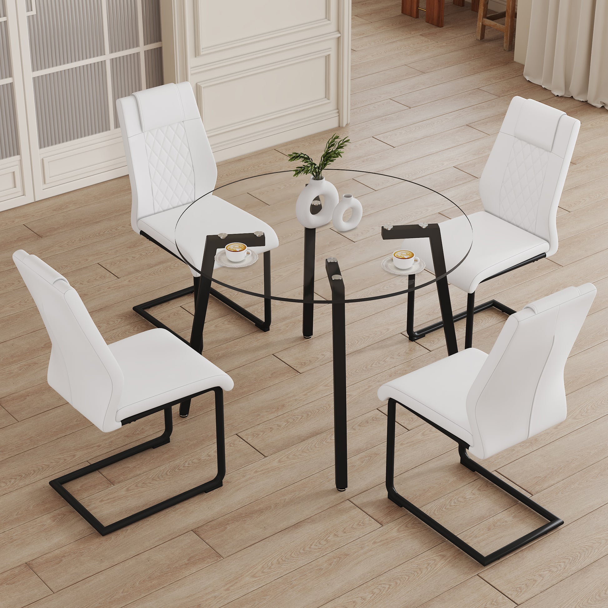 Table And Chair Set.A Modern Minimalist Style Round Clear Tempered Glass Table With Black Metal Legs.Paried With 4 Chairs With Modern Pu Leather High Back Upholstered And C Tube Black Metal Legs.