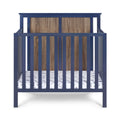 Connelly Mini Crib With Mattress Pad Midnight Blue Vintage Walnut Blue Brown Wood