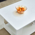 A Modern And Practical White Coffee Table. The Double Layered Coffee Table Is Made Of Mdf Material,. Suitable For Living Room, Bedroom, And Study. Ct 16 White Mdf