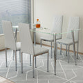 Table And Chair Set.Rectangular Dining Table With Tempered Glass Tabletop And Silver Plating Metal Legs.Paired With 4 Checkered Armless High Backlight Gray Chairs With Electroplated Metal Legs. Transparent Seats 4 Glass Metal