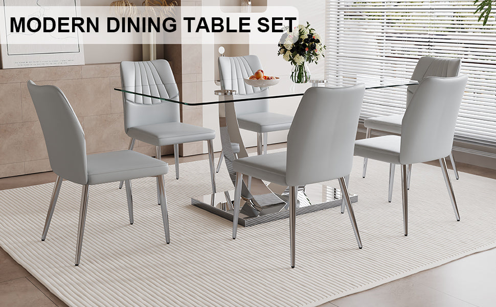 Table And Chair Set.Contemporary, Minimalist Rectangular Dining Table Featuring A Clear Tempered Glass Top And Sleek Silver Legs. Paried With Chairs Made Of Pu Material Cushion And Silver Metal Legs. Light Gray Seats 6 Glass Metal