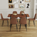 Table And Chair Set. A Minimalist Retro Rectangular Dining Table With A Specially Textured Top And Black Metal Legs, Paired With Soft Chairs And Black Metal Legs, Showcases A Beautiful Home Style. Brown Seats 6 Mdf Metal