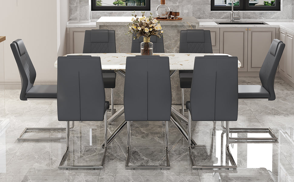 Table And Chair Set.Modern Luxurious White Marble Patterned Tempered Glass Dining Table With 8 Chairs.Single Fork Silver Metal Table Legs.Dark Gray Pu Dining Chairs With Silver Metal Legs. Dark