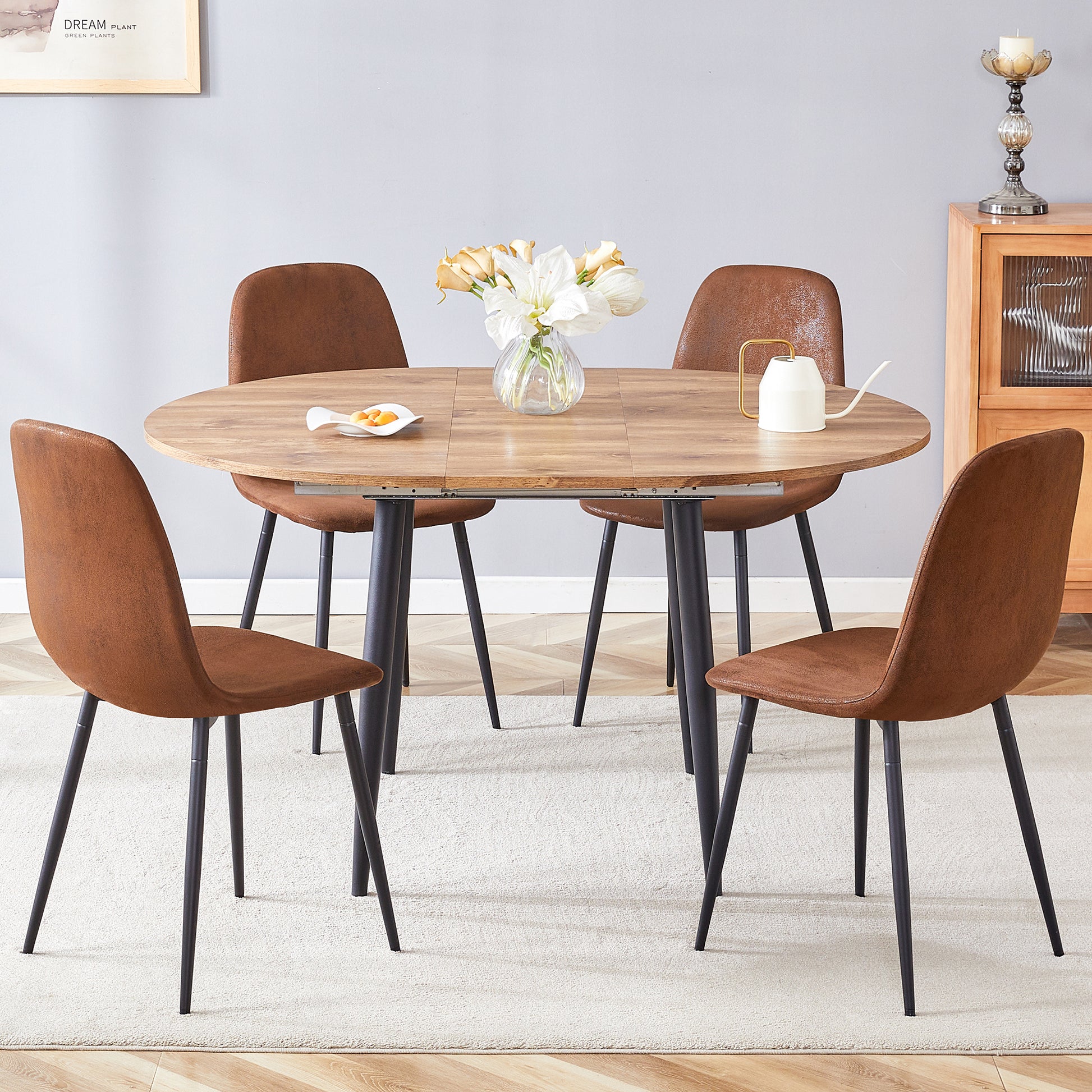 Table And Chair Set.Modern Extendable Mdf Dining Table.The Table Has A Telescopic Design, Suitable For Gatherings Of Different Size.Paired With 4 Chairs With Soft Suede Cushions And Black Metal