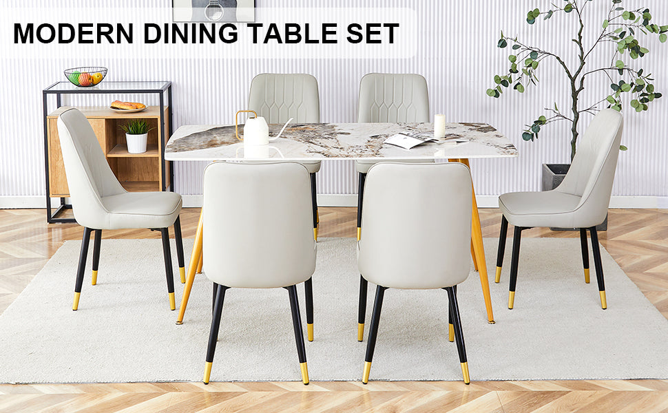 Table And Chair Set.Modern Minimalist Dining Table. White Imitation Marble Pattern Sintered Stone Desktop With Golden Metal Legs.Paried With 6 Comfortable Chairs With Pu Seats And Black Metal Legs.