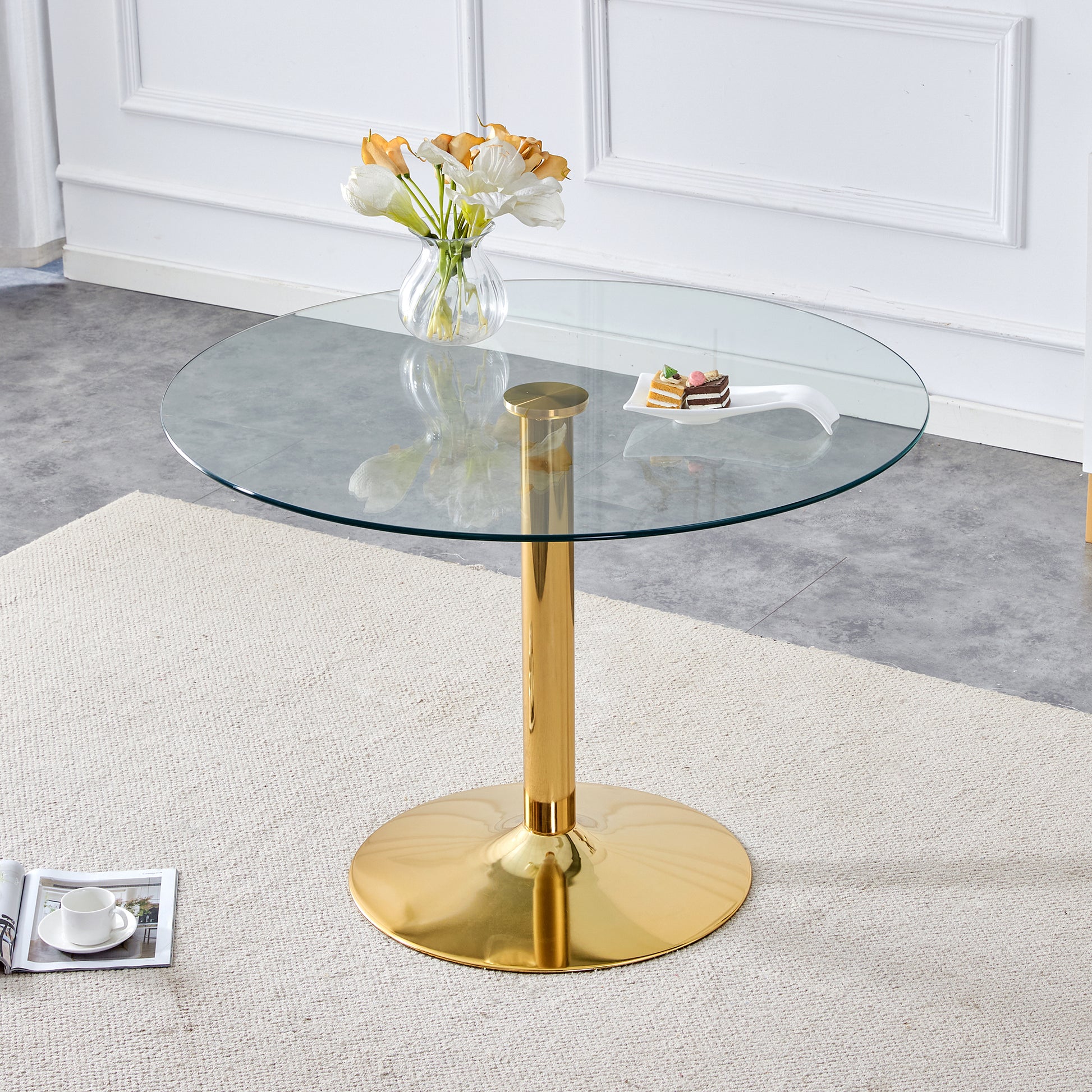 A 42 Inch Diameter Glass Top And A Modern, Minimalist Round Dining Tab