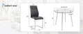 A Modern Minimalist Round Transparent Tempered Glass Table With Silver Metal Legs And 4 Modern Pu Leather High Backed Dining Chairs For A Luxurious Experience. Black Seats 4 Glass Metal