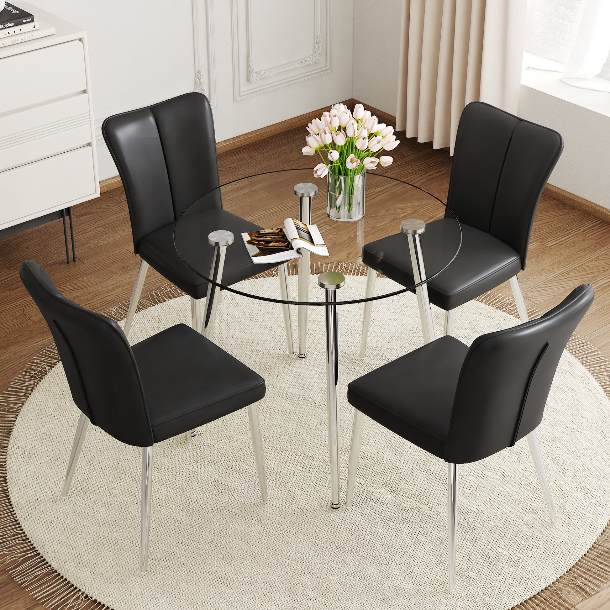 Table And Chair Set.A Modern Minimalist Round Dining Table With Transparent Tempered Glass Top And Silver Metal Legs,Paried With Chairs With Pu Backrest And Seat Cushion And Silver Metal Legs. Black Seats 4 Glass Metal