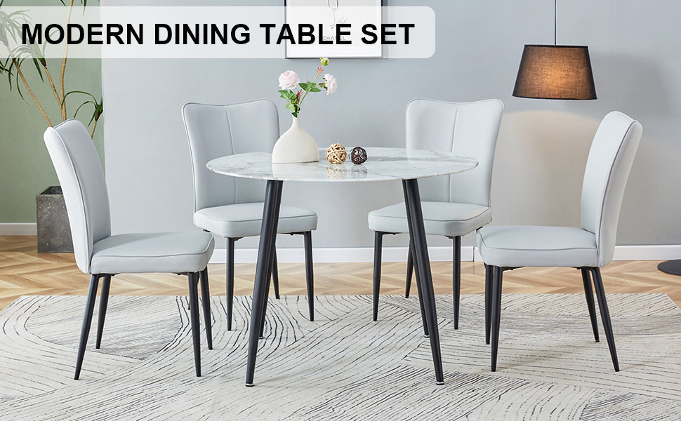 Table And Chair Set. Large Modern White Imitation Marble Patterned Round Table With Black Metal Legs. Nice Minimalism, Comfortable Seats And Black Metal Legs. White Gray Seats 4 Glass Metal