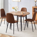 Table And Chair Set.Modern Extendable Mdf Dining Table.The Table Has A Telescopic Design, Suitable For Gatherings Of Different Size.Paired With 4 Chairs With Soft Suede Cushions And Black Metal