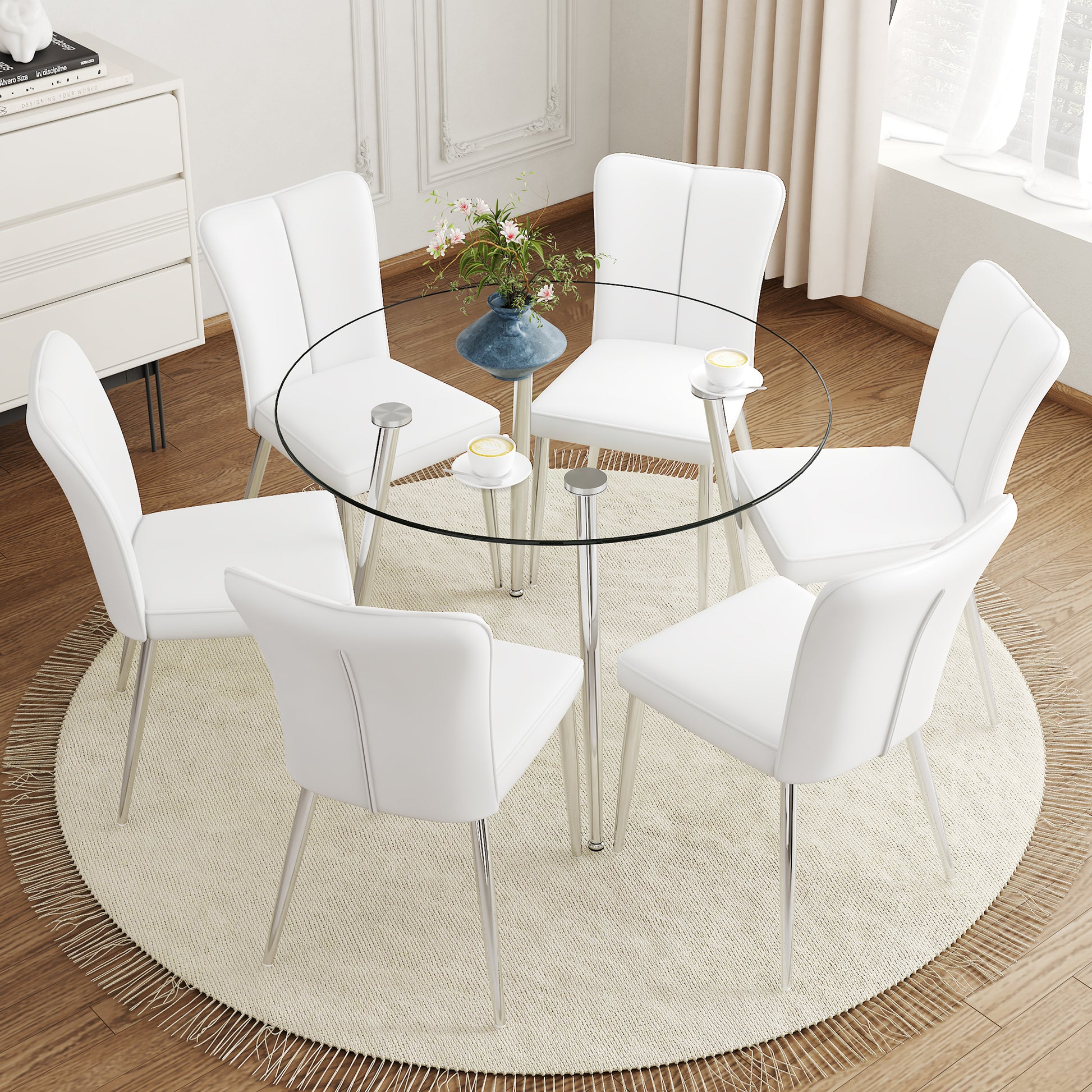 Table And Chair Set.A Modern Minimalist Round Dining Table With Transparent Tempered Glass Top And Silver Metal Legs,Paried With 6 Chairs With Pu Backrest And Seat Cushion And Silver Metal Legs.