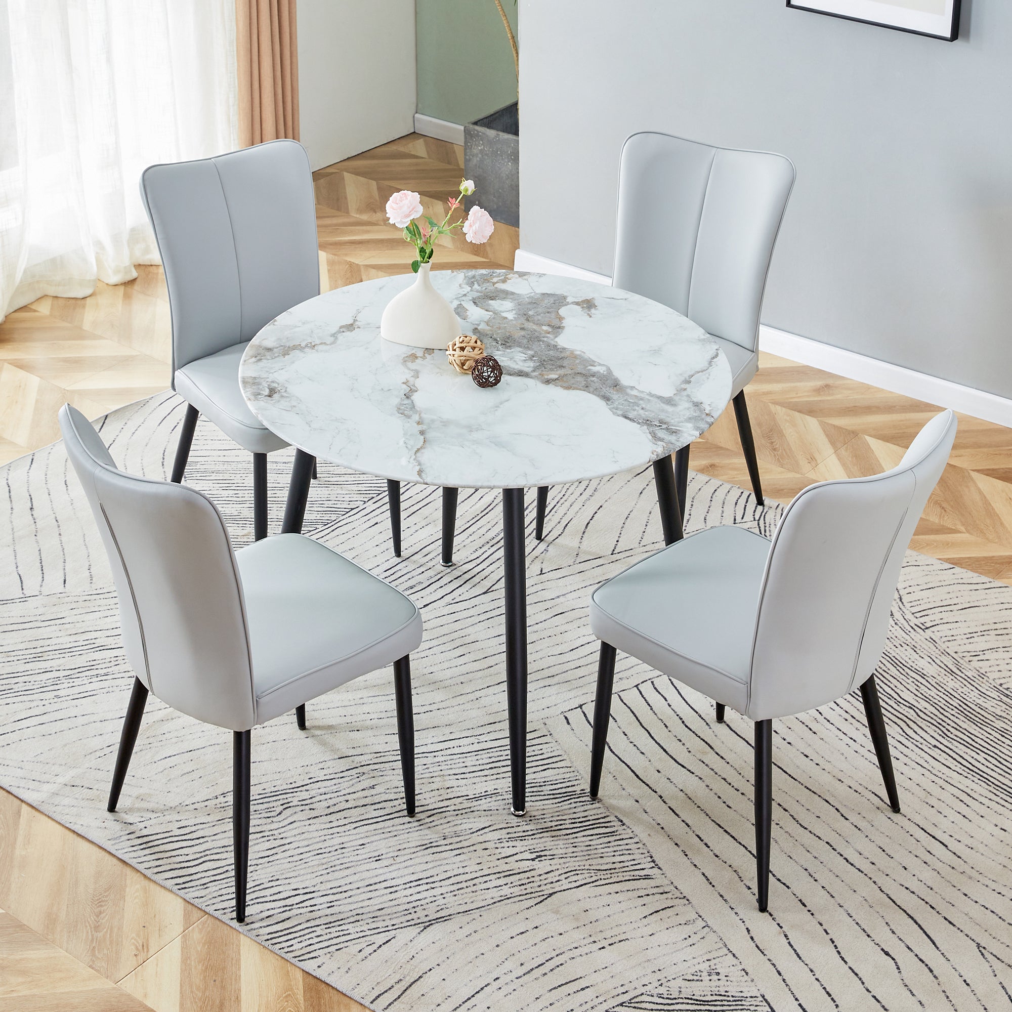 Table And Chair Set. Large Modern White Imitation Marble Patterned Round Table With Black Metal Legs. Nice Minimalism, Comfortable Seats And Black Metal Legs. White Gray Seats 4 Glass Metal