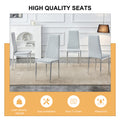 Table And Chair Set.Rectangular Dining Table With Tempered Glass Tabletop And Silver Plating Metal Legs.Paired With 6 Checkered Armless High Back Light Gray Chairs With Electroplated Metal Legs. Transparent Seats 6 Glass Metal
