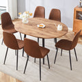 Table And Chair Set.Modern Extendable Mdf Dining Table.The Table Has A Telescopic Design, Suitable For Gatherings Of Different Size.Paired With 6 Chairs With Soft Suede Cushions And Black Metal