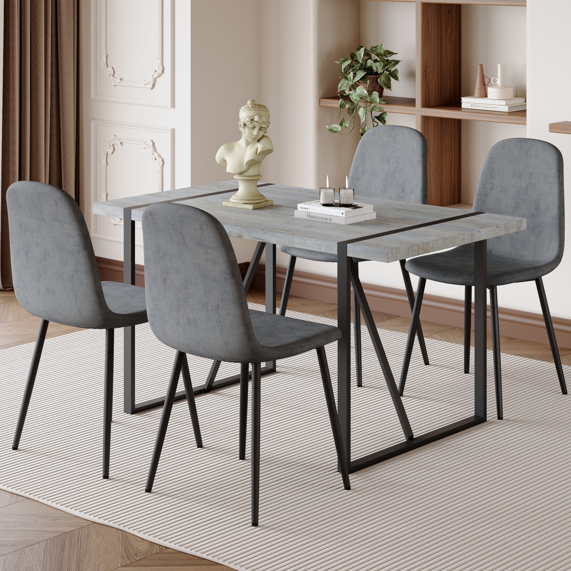 Table And Chair Set. A Minimalist Retro Rectangular Dining Table With A Specially Textured Top And Black Metal Legs, Paired With 4 Soft Chairs And Black Metal Legs, Showcases A Beautiful Home Style.