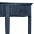 Distinctive Features Of Pine Veneer Console Table With Vertical Stripe Drawer Fronts And Four Legs Navy Blue Primary Living Space Minimalist Mdf