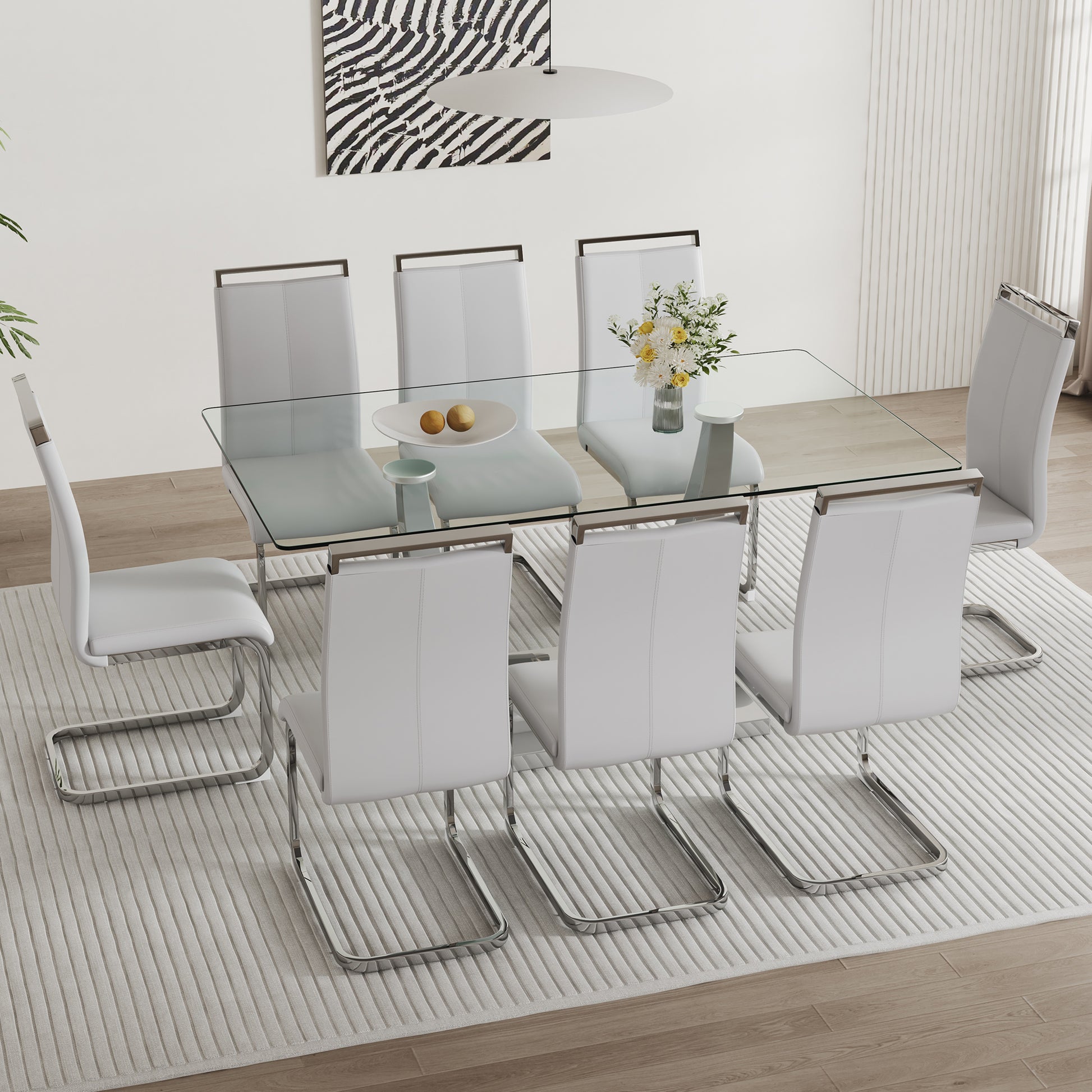 Table And Chair Set. Large Modern Rectangular Table With Glass Top And Silver Metal Legs. Furnished With Soft And Comfortable Pu Chairs With Faux Leather Upholstered Seats And Silver Metal Legs. Gray Silver Seats 6 Glass Metal